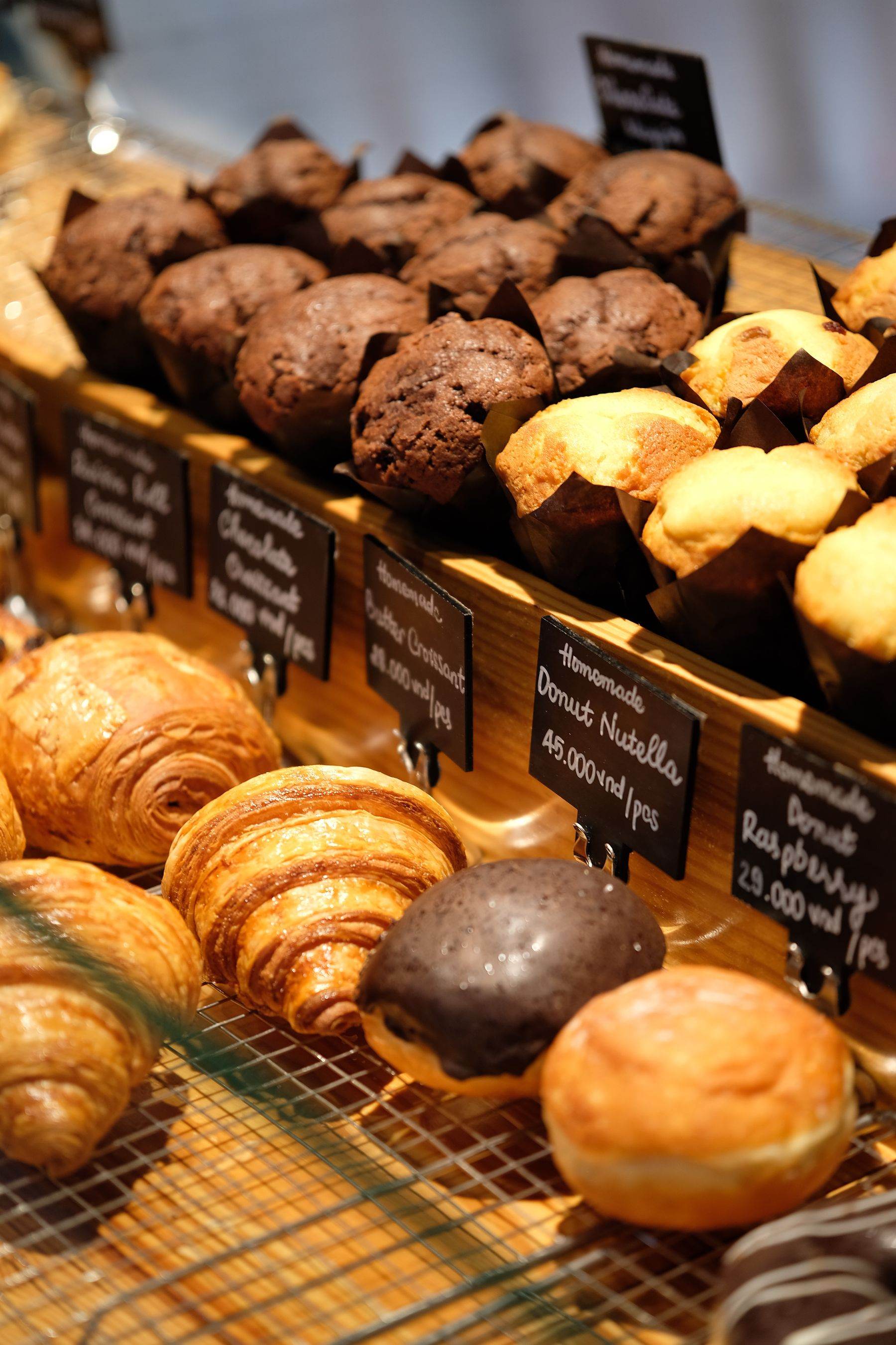 The counter with tins and a queue of bakes.